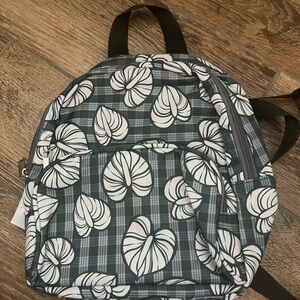 Hawaiian print mini Backpack with White Leaf Print